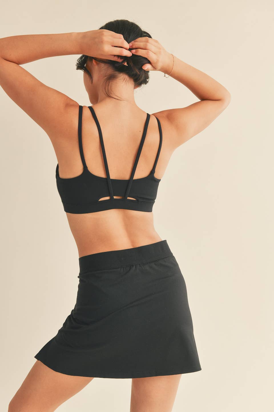 The Brianna Black  Light Support Padded Strappy Sports Bra