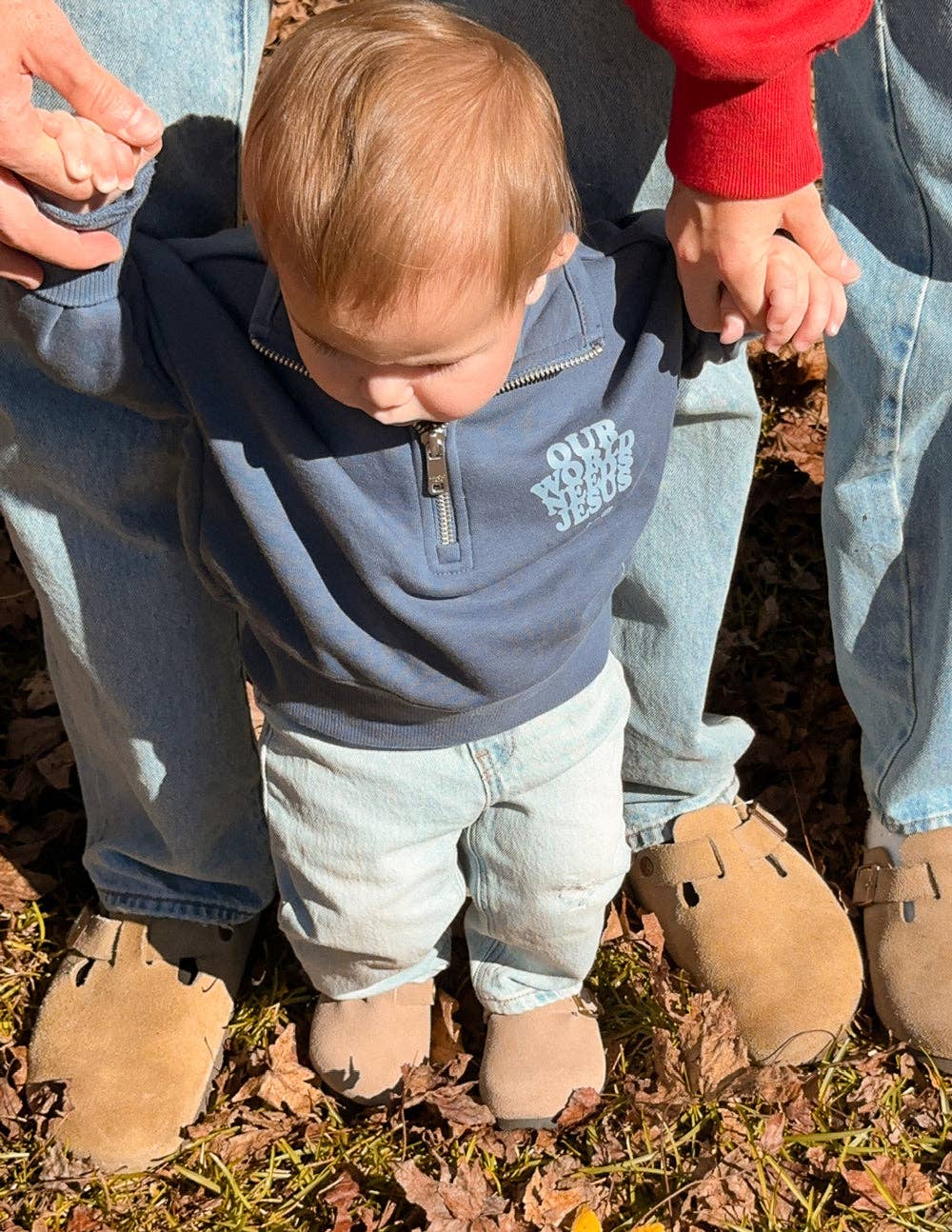 Our World Needs Jesus Kids Half Zip