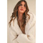 Oversized Faux Fur Hooded Jacket with Pockets